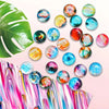A collection of colorful glass cabochons and magnets arranged on a pink background.