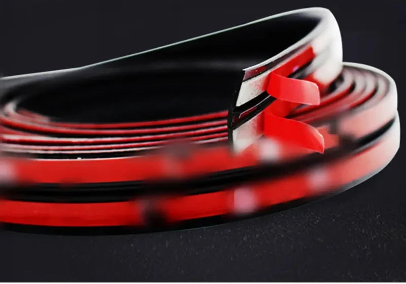 Close-up view of a red rubber seal strip designed for car windows, windshields, and sunroofs.