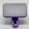 A purple clip-on LED selfie light with a rectangular translucent body and a purple mounting piece.