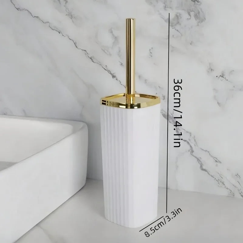 A tall white toilet brush set with a gold rotating stand is shown next to a white bathtub.
