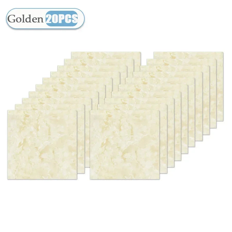 A stack of gold-colored self-adhesive waterproof tile stickers for kitchen and bathroom
