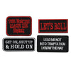 Four black and red embroidered iron-on letter patches with various phrases like Let's Roll and Get On Shut Up & Hold On