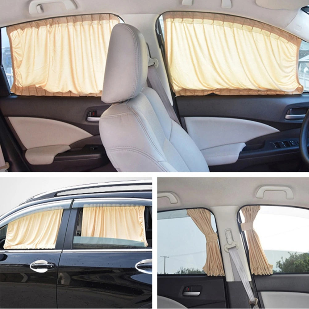 Interior view of a car showing a beige fabric sun shade covering the side windows.