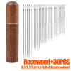 A set of 30 rosewood sewing needles stored in a cylindrical wooden container.