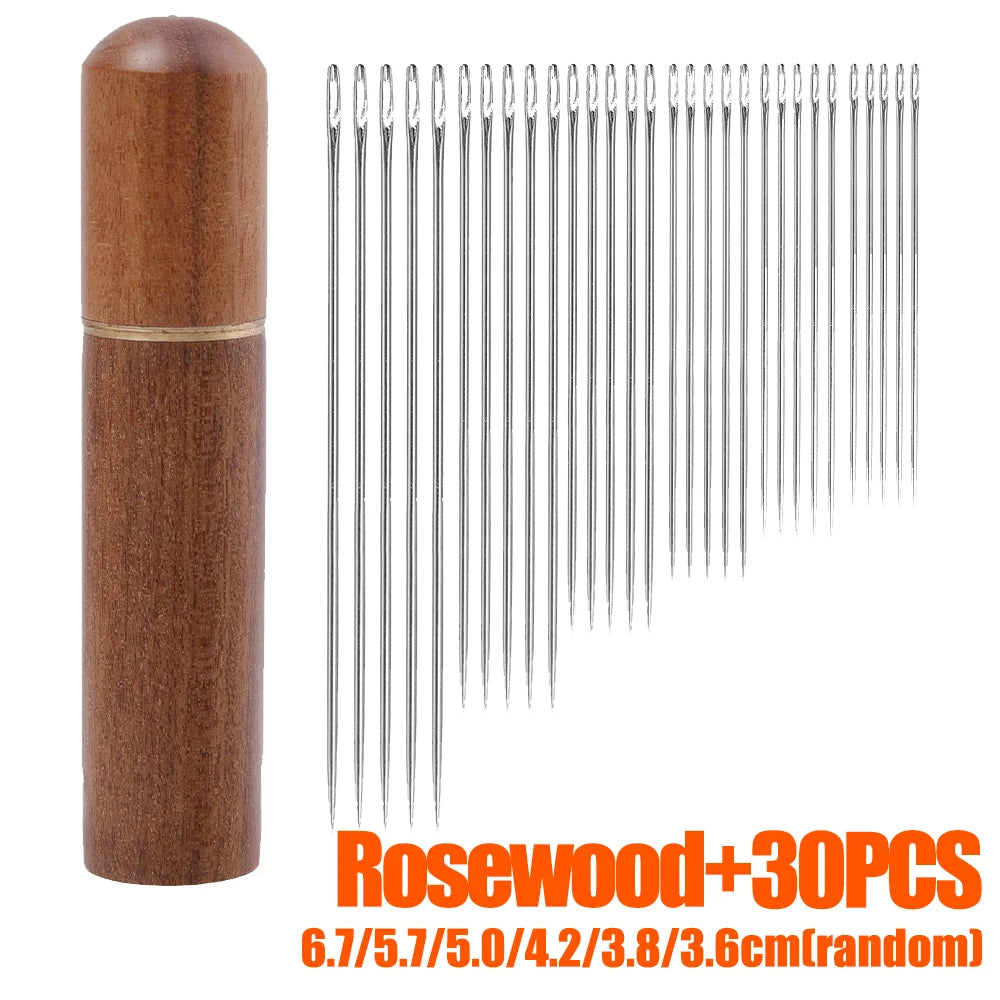 A set of 30 rosewood sewing needles stored in a cylindrical wooden container.