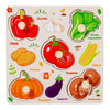 Wooden puzzle featuring various fruits and vegetables like chili, tomato, corn, potato, pumpkin, eggplant, and mushroom.