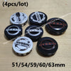Four black and silver wheel center hub caps for Nissan models in various sizes 51/54/59/60/63mm