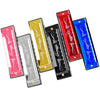 A set of ten-hole C key harmonica for beginners with colorful finishes in red, yellow, and blue.