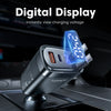 A close-up of a black car charger with a blue digital display showing charging voltage.