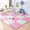 An interlocking foam play mat with various toys and a climbing arch for babies and toddlers.