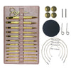 A set of gold-tipped aluminum crochet hooks with interchangeable cords and a matching leather storage case.