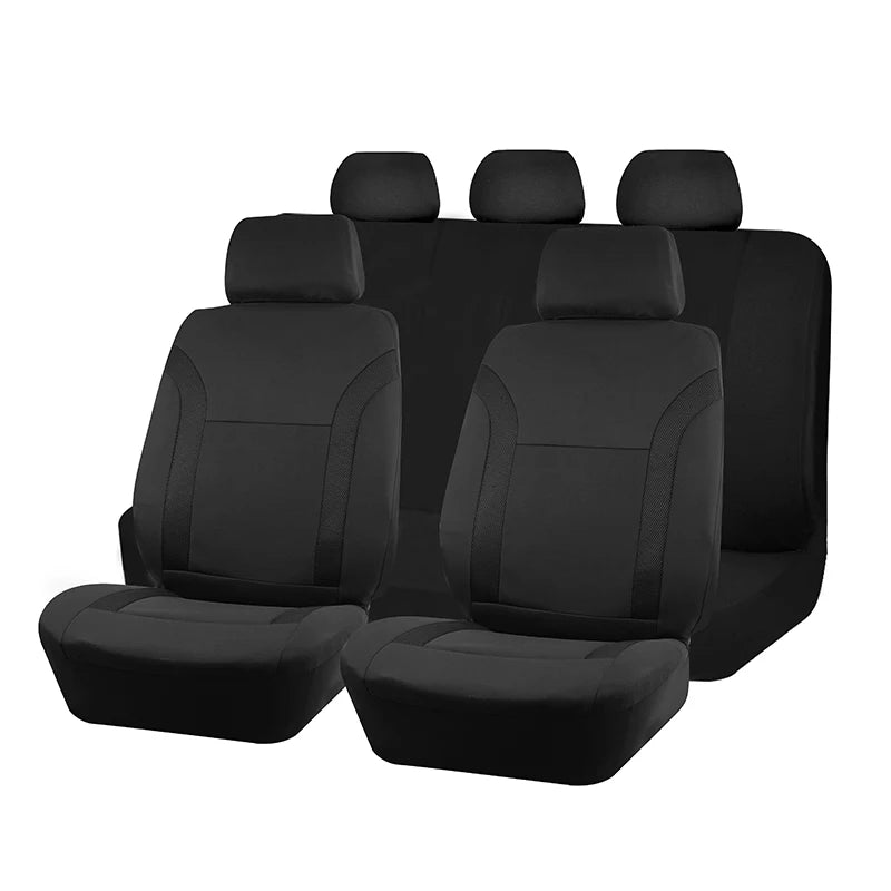 A set of black car seat covers with headrests shown in a row.