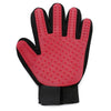 A pair of bright pink silicone pet grooming gloves with textured palms and black cuffs.