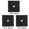 Three individual black silicone stove burner mats, each featuring a circular hole.