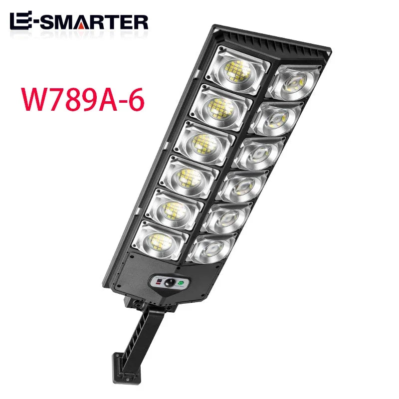 A rectangular LED light fixture with multiple bulbs mounted on a black housing for garden or outdoor use.