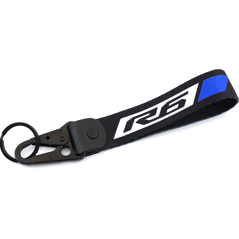 Black and blue brake fluid reservoir cover sock for Yamaha R1 R6 motorcycle.