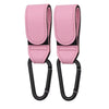 A pair of pink PU leather stroller hooks with black accents for organizing bags on strollers and prams.