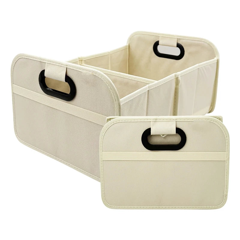 A beige foldable car trunk organizer with carry handles shown in a flat lay view.