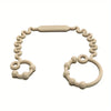 A silicone anti-drop pacifier clip with a teether, light beige color.
