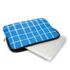 A blue and white checkered laptop sleeve with a black zipper closure.