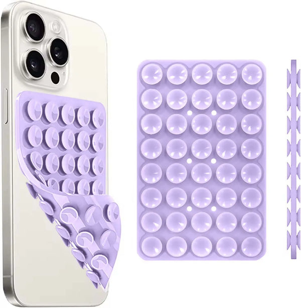 Weißes Smartphone-Cover und lila Silikon-Suction-Mount mit mehreren Saugnäpfen.