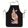 Black apron featuring a hand painting nails with a silver tool and pink heart accents.