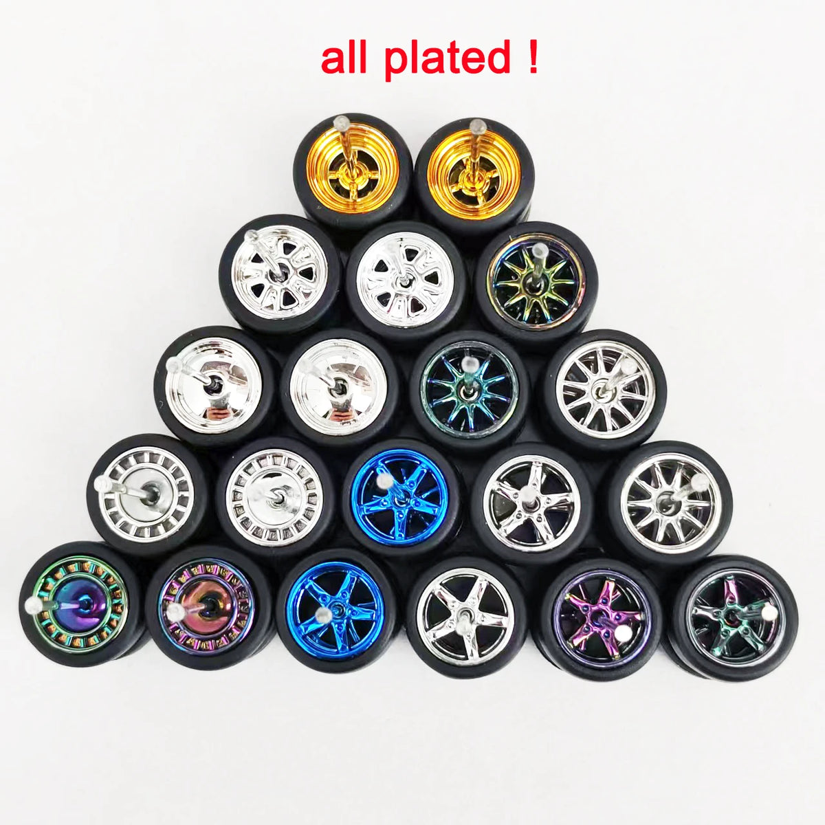 A collection of eleven plated 1:64 scale alloy car wheels and tires displayed in a pyramid formation.