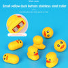 A small yellow duck bottom stainless steel roller toy for bath time fun