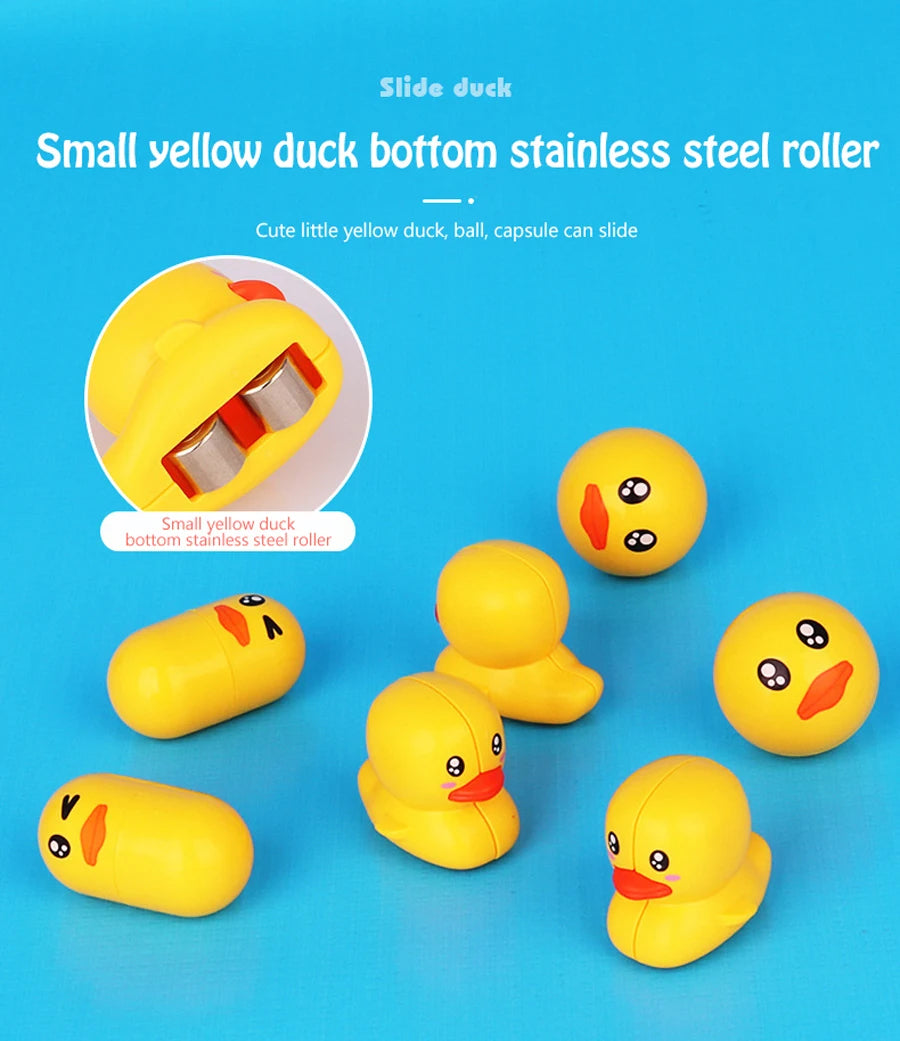 A small yellow duck bottom stainless steel roller toy for bath time fun