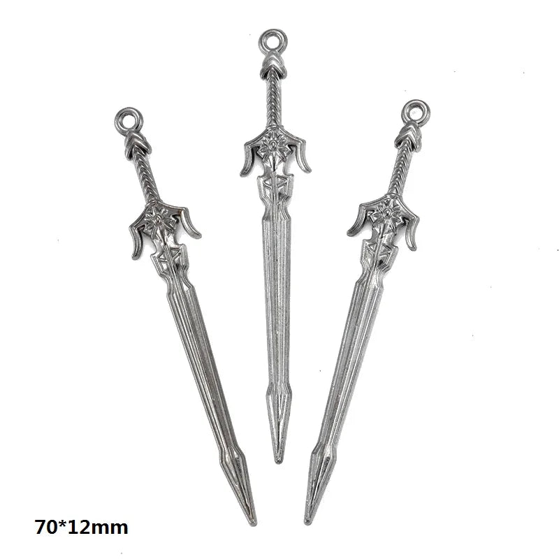 A set of 16 gun-shaped charms for DIY jewelry making in silver metal.