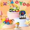 A colorful air dry clay modeling set featuring various animal and fruit shapes, tools, and a wooden house structure.