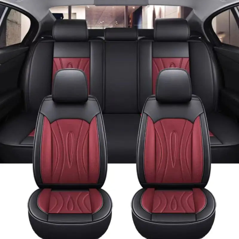 Black and red full coverage PU leather car seat covers shown in a vehicle interior.