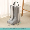 A clear mesh waterproof boot storage bag with a handle shown next to a wooden furniture piece.