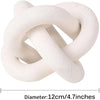 White handcrafted wood knot decor used as a boho coffee table accent