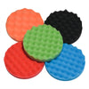 A set of five colored foam polishing pads for car detailing, including orange, green, red, black, and blue.