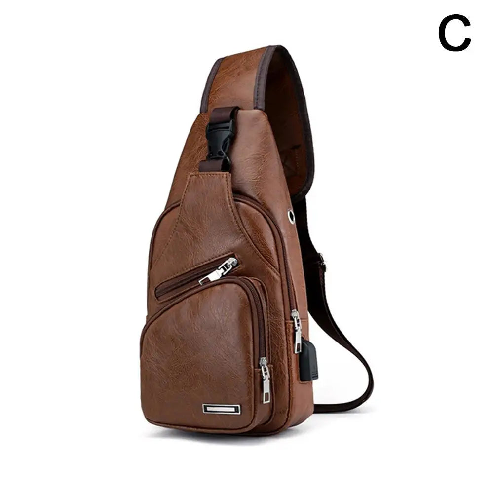 A brown leather men's crossbody sling bag with a flap and zippered pockets.