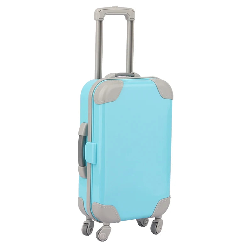 Light blue and gray doll travel suitcase with a handle and wheels