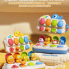 Two dual-theme Peek-a-Boo baby soothers featuring cute animal figures like a yellow duck and blue fish.