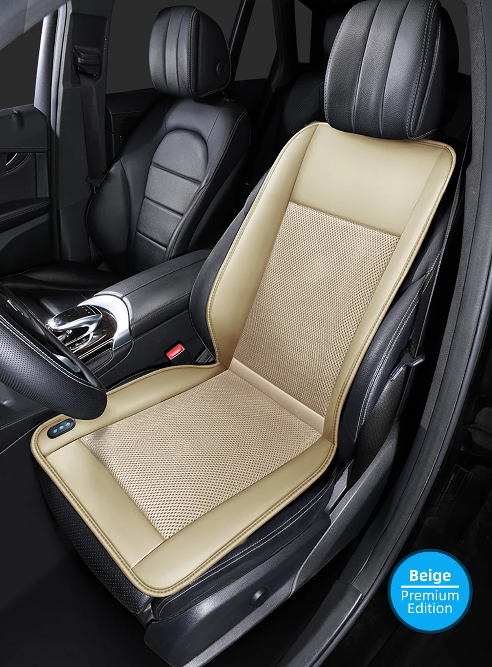 Interior view of a black car seat with a beige leather cushion and perforated fabric insert.