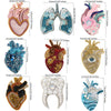 A collection of sparkling beaded and rhinestone patches shaped like hearts, anatomical features, and other designs for clothi