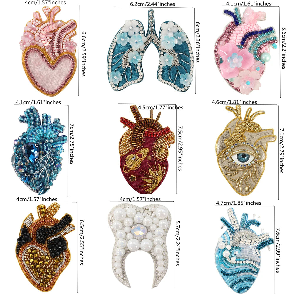 A collection of sparkling beaded and rhinestone patches shaped like hearts, anatomical features, and other designs for clothi