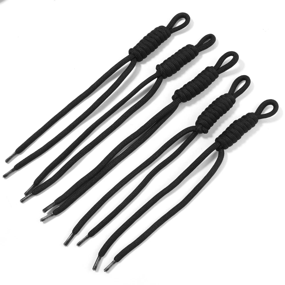 A set of black braided nylon lanyards or keychains for DIY crafts.