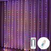 Purple sheer curtains illuminated by fairy lights with a remote control and timer