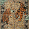 An area rug featuring a detailed print of a tiger in orange and black stripes on a beige background.