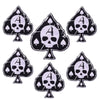 A set of ten black and white embroidered iron-on patches featuring skull and tree designs.