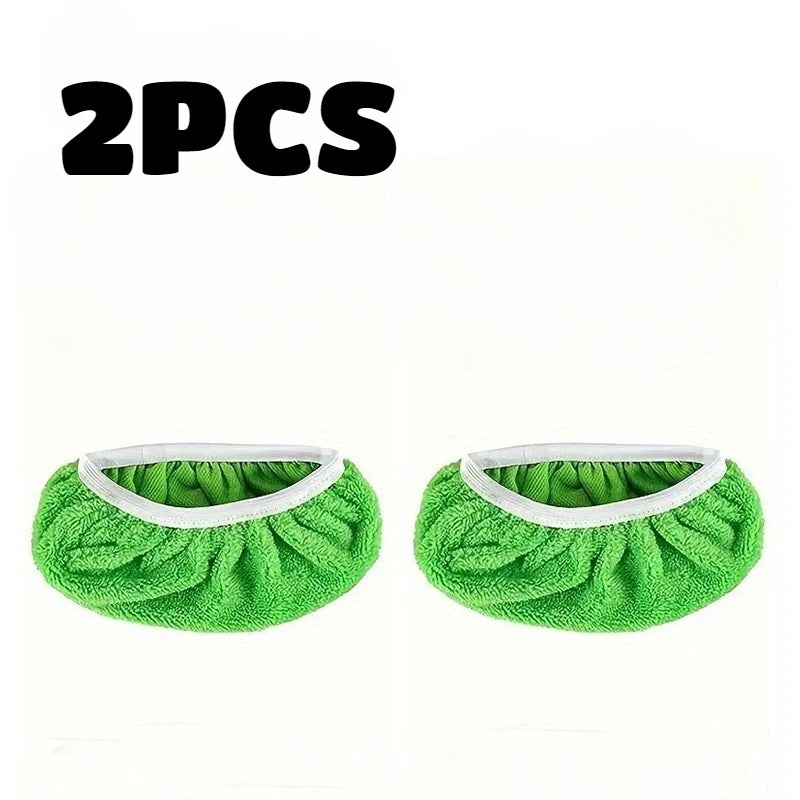 Two green reusable microfiber mop refill pads shown flat, with white trim.