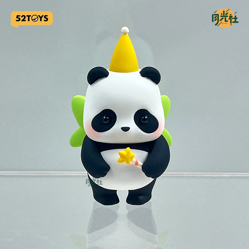 A white and black panda blind box figure with yellow ears and a gold cone hat holding a yellow star.