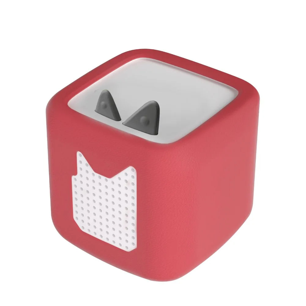 A red silicone protective cover for a Toniebox 2 device.