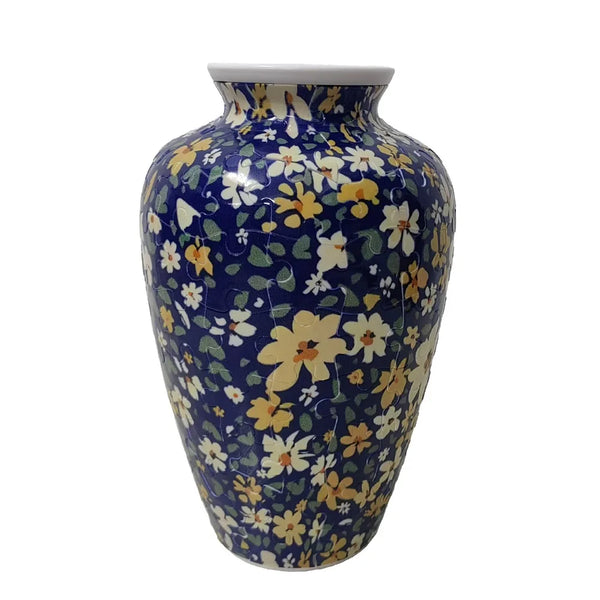 A ceramic vase with a blue and yellow floral pattern, featuring a glossy finish.