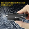 A hand holds a black mini car emergency tool designed to break a window quickly.